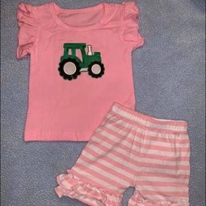 Girls 2T pink tractor set.